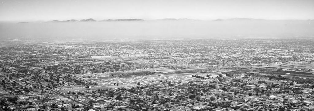 "Santa Ana Boulevard and Wilmington Avenue, Watts, looking northeast, 1960 (Kelly-Holiday Mid-Century Aerial Collection/Los Angeles Public Library)"